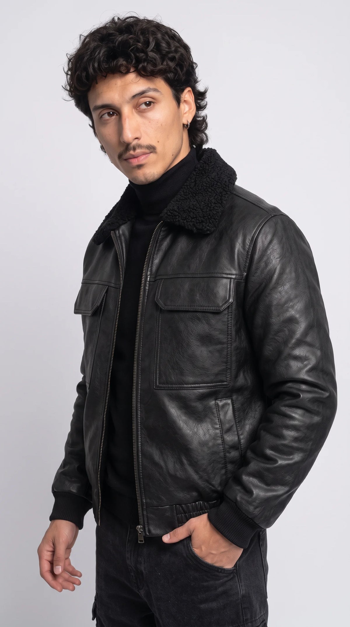 Step into the shadows with the ultimate darkwear essential, the Jackero triple black leather jacket featuring matching black shearling for a sleek, stealth-inspired streetwear aesthetic.