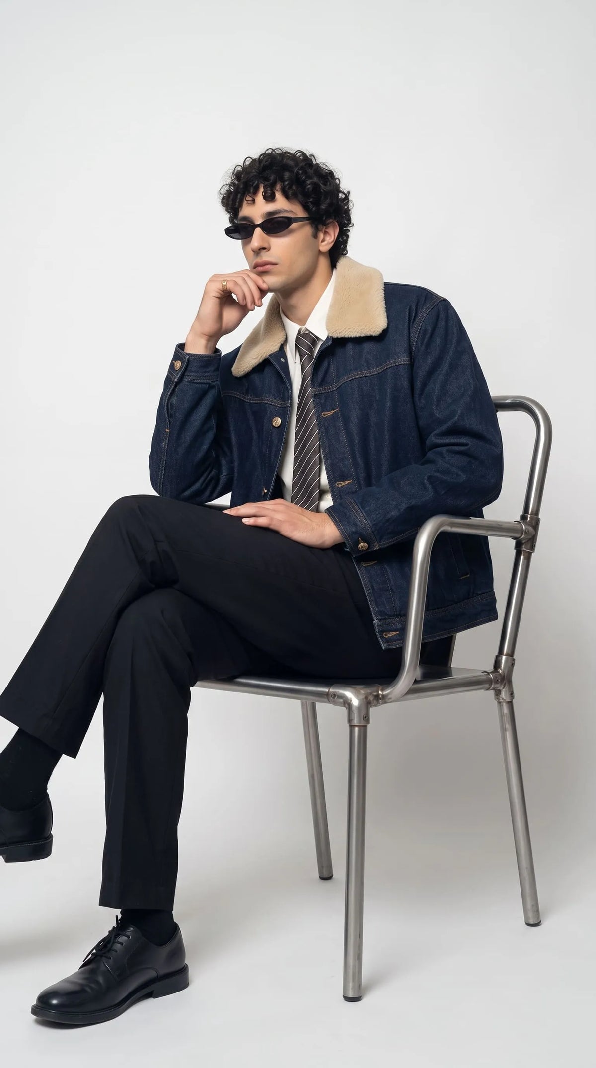 A must-have Jackero warm fleece collar indigo denim apparel piece, designed to keep you cozy while maintaining a sharp, engaging streetwear look during those chilly city nights.