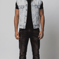Sleek light wash denim sleeveless jacket designed for a modern urban street look and relaxed everyday wear.