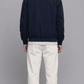 Rear view of dark navy blue cotton casual jacket showing clean back shoulder seam and straight hemline
