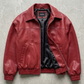 Premium streetwear fashion lookbook featuring a high-quality red leather bomber jacket with front zipper.