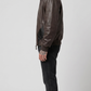 Sleek motorcycle style leather jacket with elegant dark brown sleeves and black crocodile printed torso.