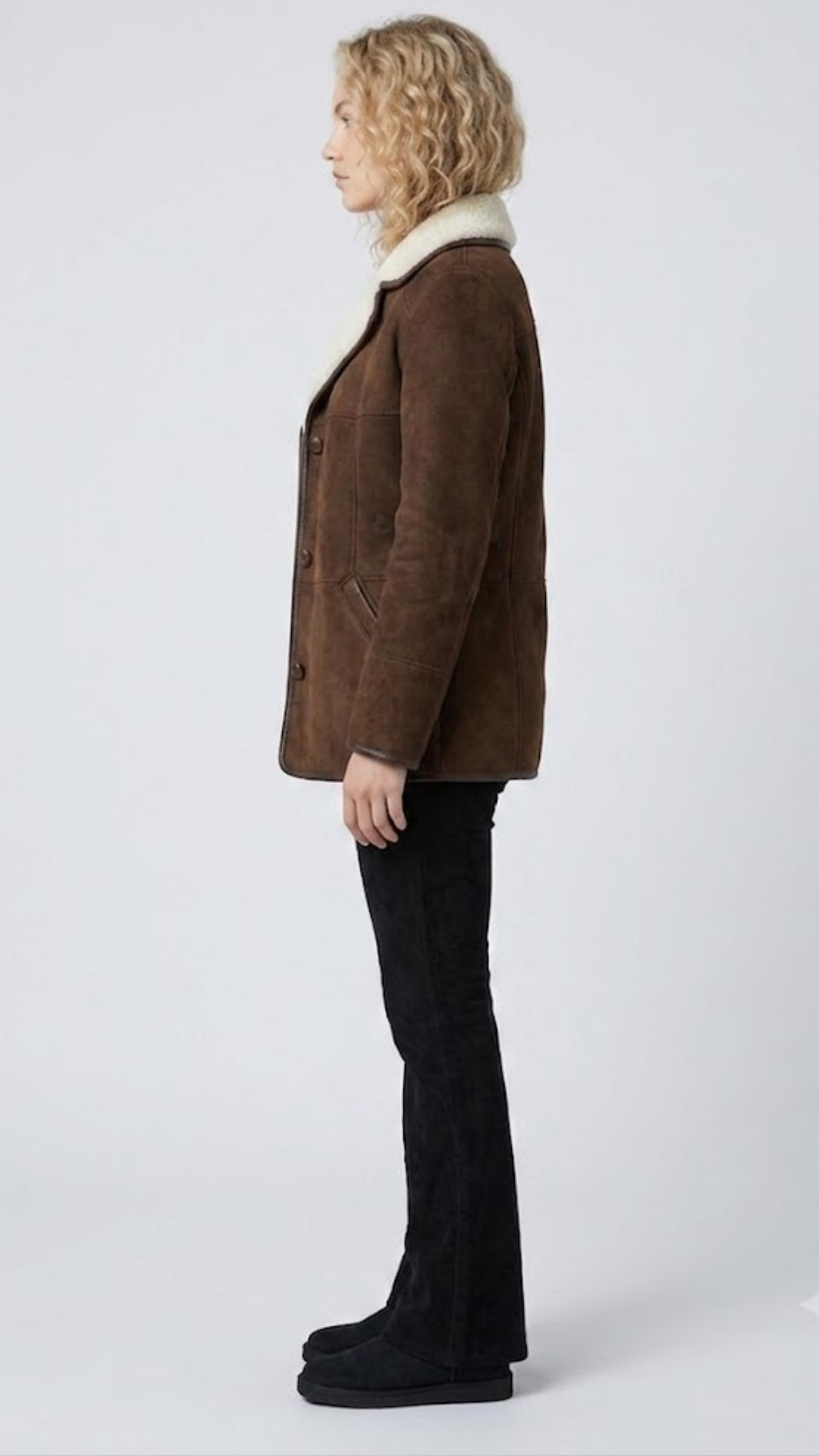 Heavy-duty and cozy chocolate brown suede jacket with full inner shearling insulation, designed for sub-zero weather.