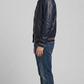 the comfortable elastic ribbed cuffs and matching waistband trim of the dark blue outerwear.