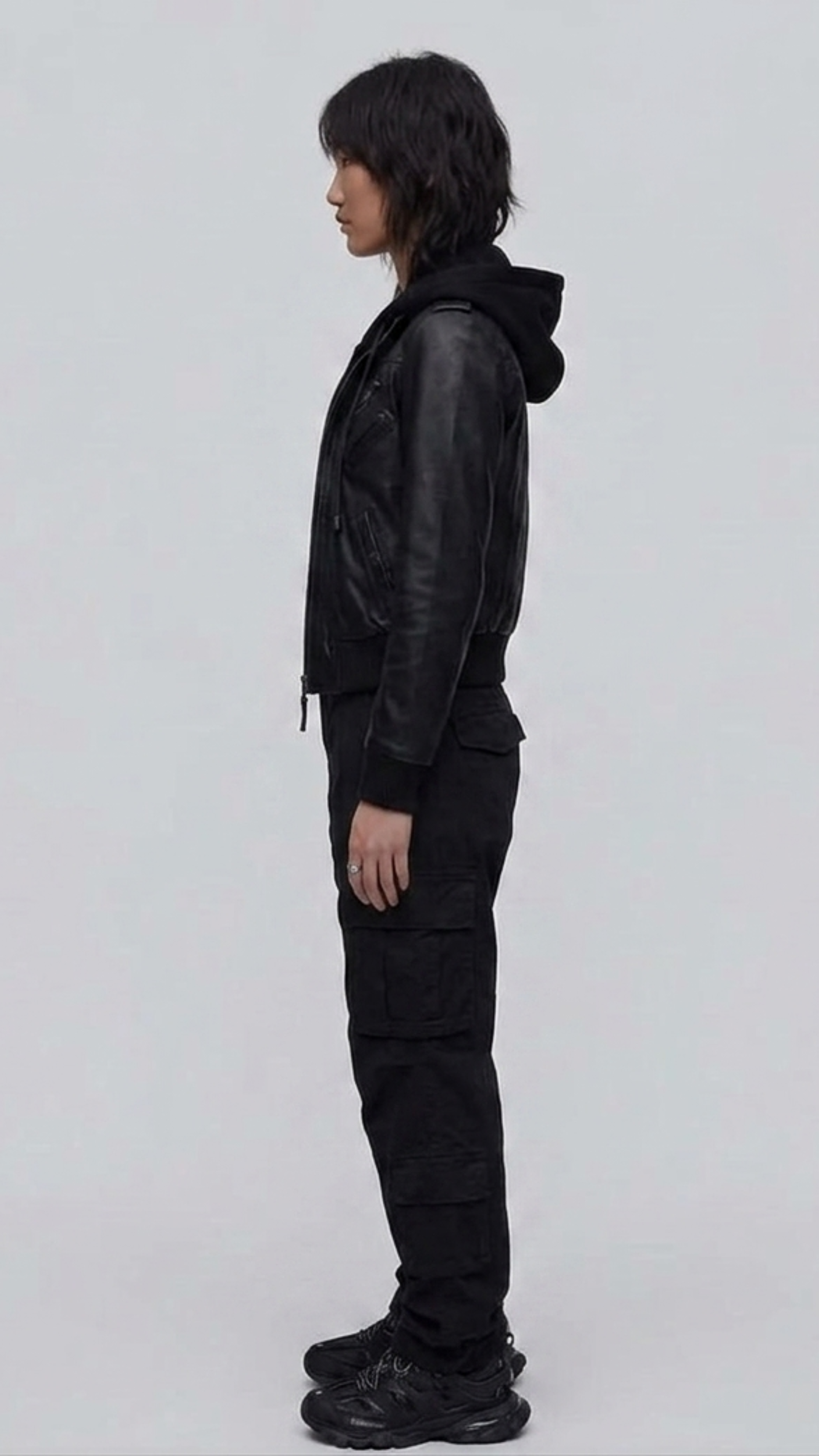 Side angle profile view highlighting the matte black heavy hardware zipper and snug elastic ribbed cuffs of the Y2K style outerwear.