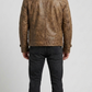 Regular fit men's brown weathered leather utility coat displaying a clean profile, sharp collar, and comfortable waist alignment.