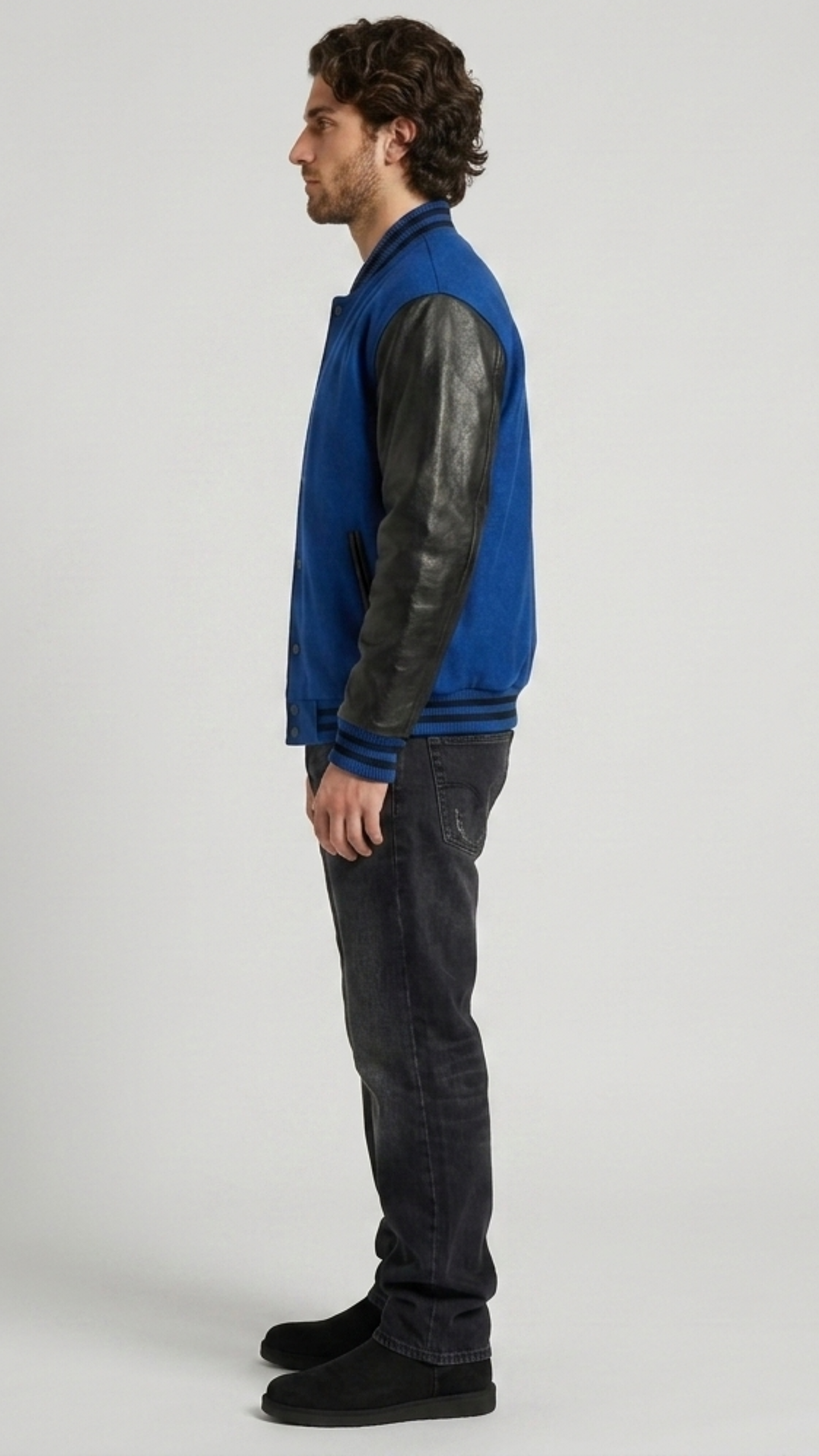 Regular fit men's blue suede bomber jacket with leather-trimmed side welt pockets, offering both utility and a sporty profile.