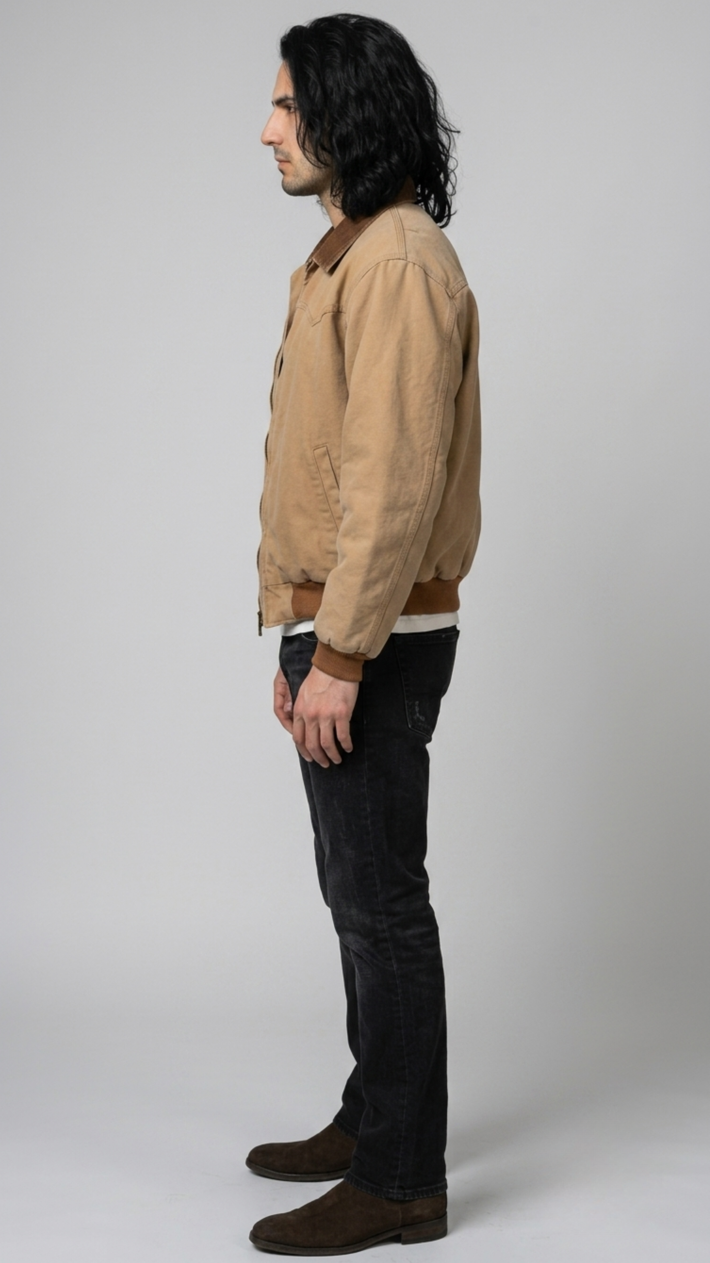 Minimalist tan cotton jacket perfectly layered over a basic white t-shirt for an effortless daily streetwear outfit.