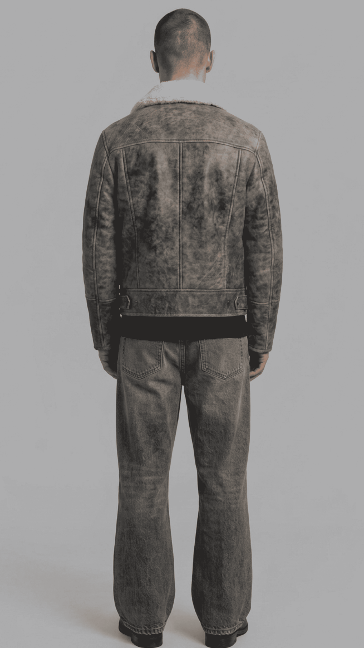 Men's classic aviator style charcoal grey leather jacket with cozy white shearling trim.