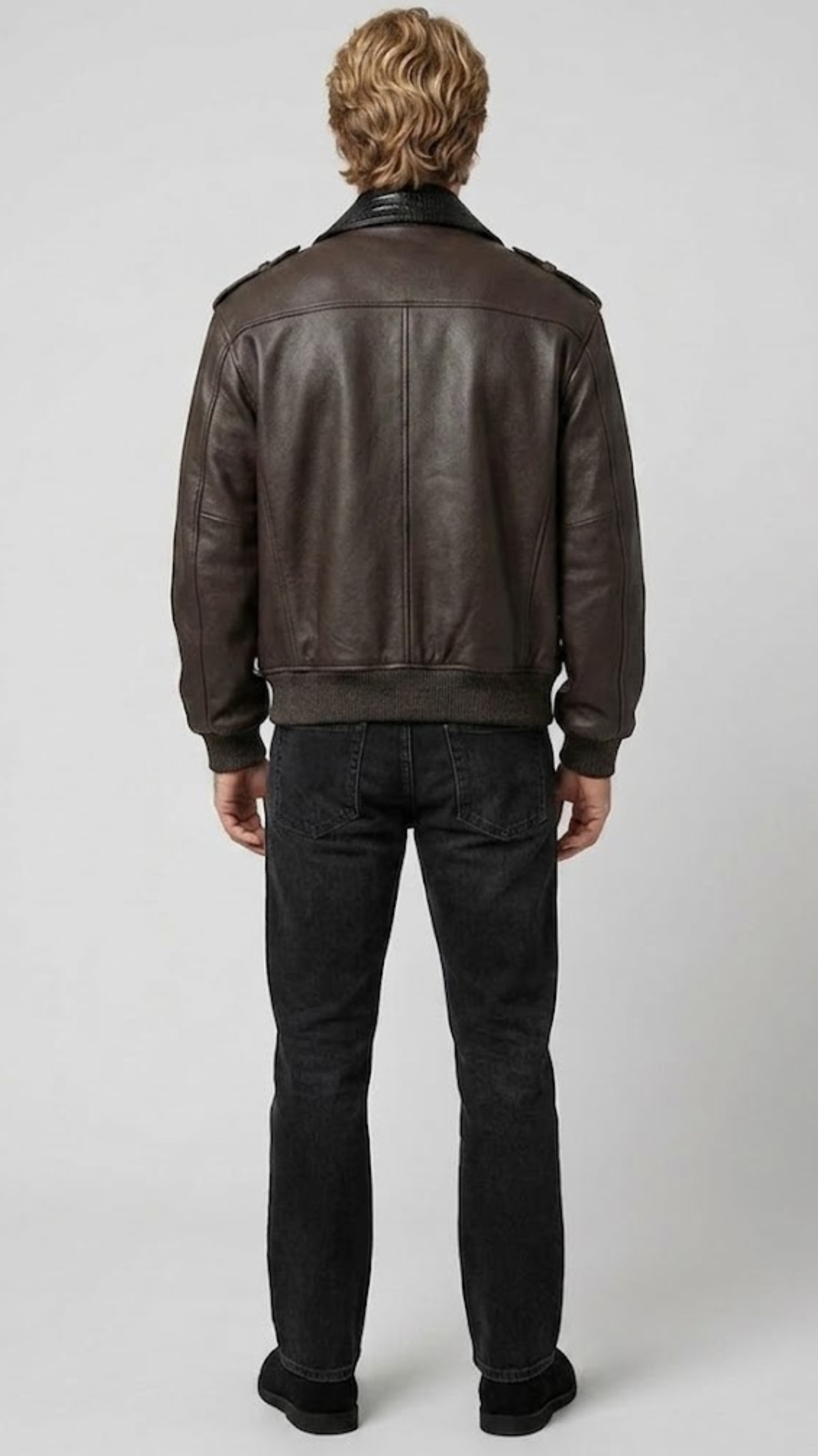 Men's luxury fashion featuring a unique two-tone dark brown and black croc skin textured leather jacket.