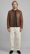 Front perspective of a premium brown leather jacket by Jackero, displaying a warm chocolate shade, clean zipper closure, and classic pocket placement.