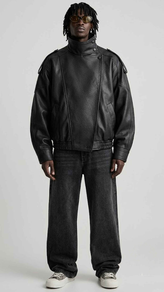 Front view of men wearing black wrap-around high neck leather oversized jacket with asymmetrical snap collar.
