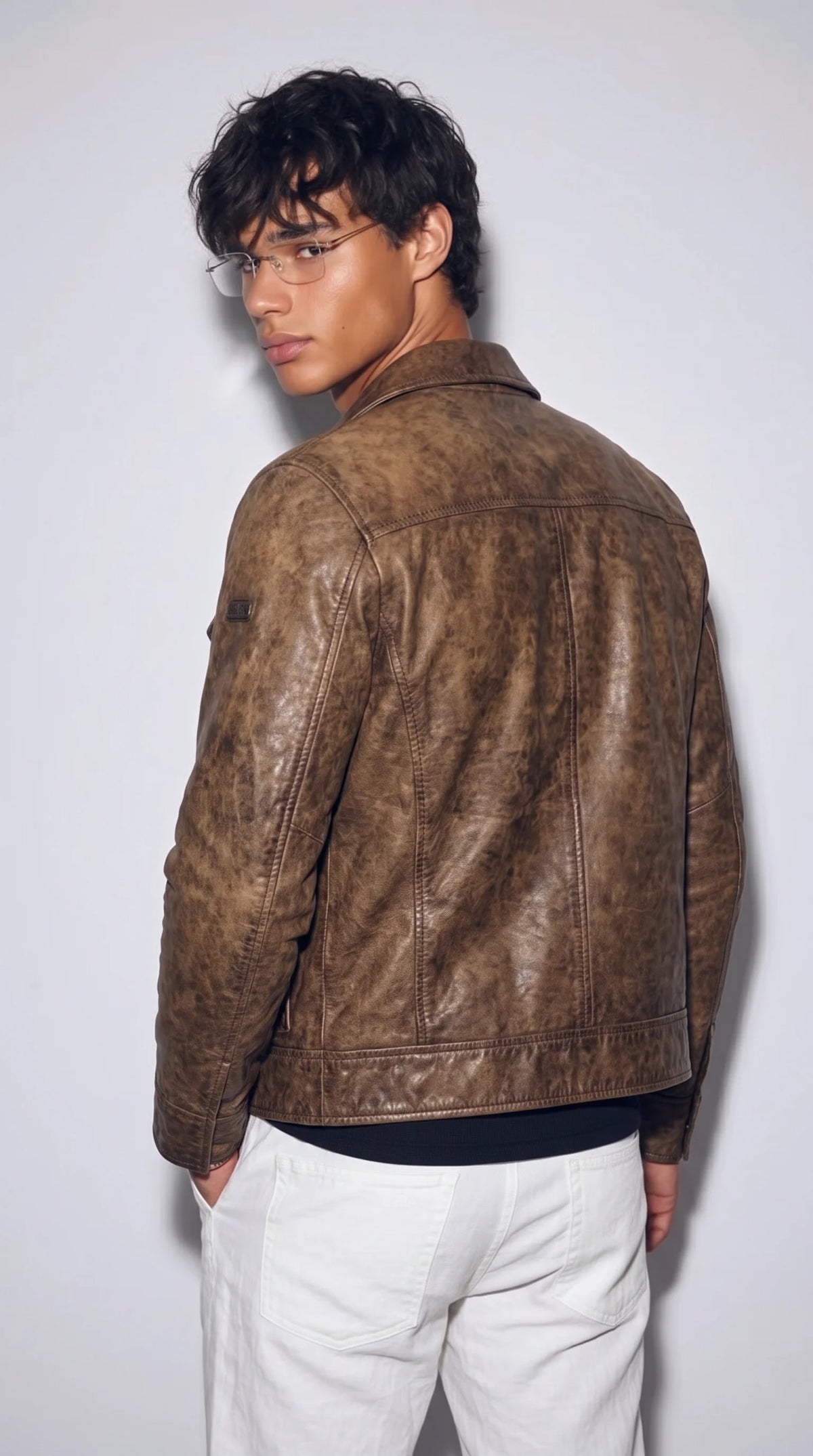 Men's brown distressed genuine leather utility jacket featuring four button-flap cargo pockets, including two pleated chest pockets and two lower pockets, with a rugged field-jacket shape that blends practical detailing and vintage-inspired street style.