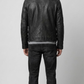 Symmetrical rear view studio shot highlighting the broad shoulder architecture and clean matte finish of the noir leather motorcycle coat.