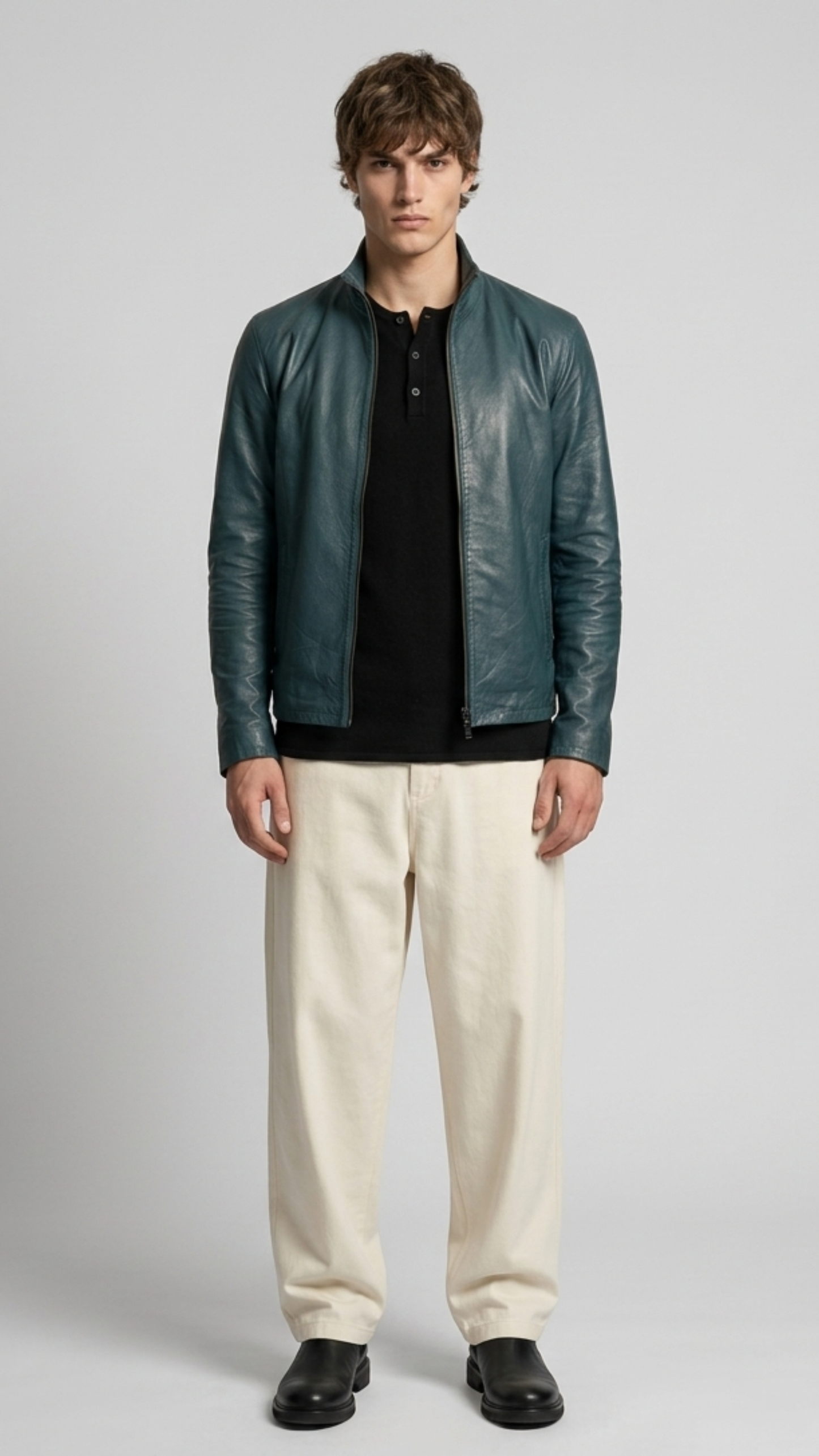 Jackero premium dark cyan leather jacket styled with crisp high-fashion urban streetwear.