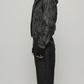 Jackero black distressed leather hooded coat showing the fit and hood drape.