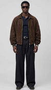 a mens wearing a JACKERO dark chocolate brown suede jacket featuring an oversized baggy fit and clean front zipper.