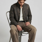 Sleek distressed charcoal leather jacket for men in dark grey finish