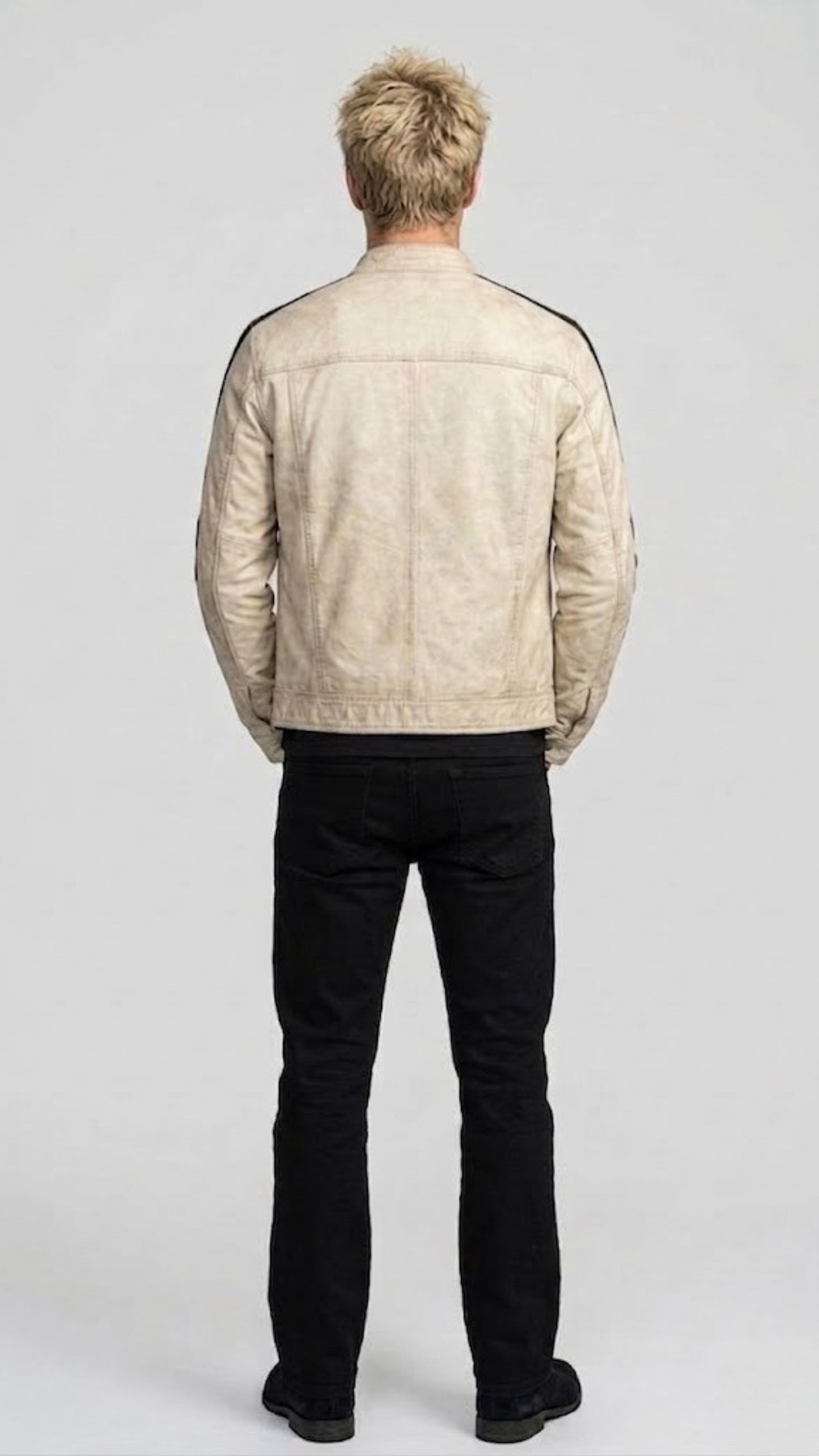 Symmetrical rear view studio shot highlighting the minimalist panel structure and pristine cream leather profile of the luxury racer coat.