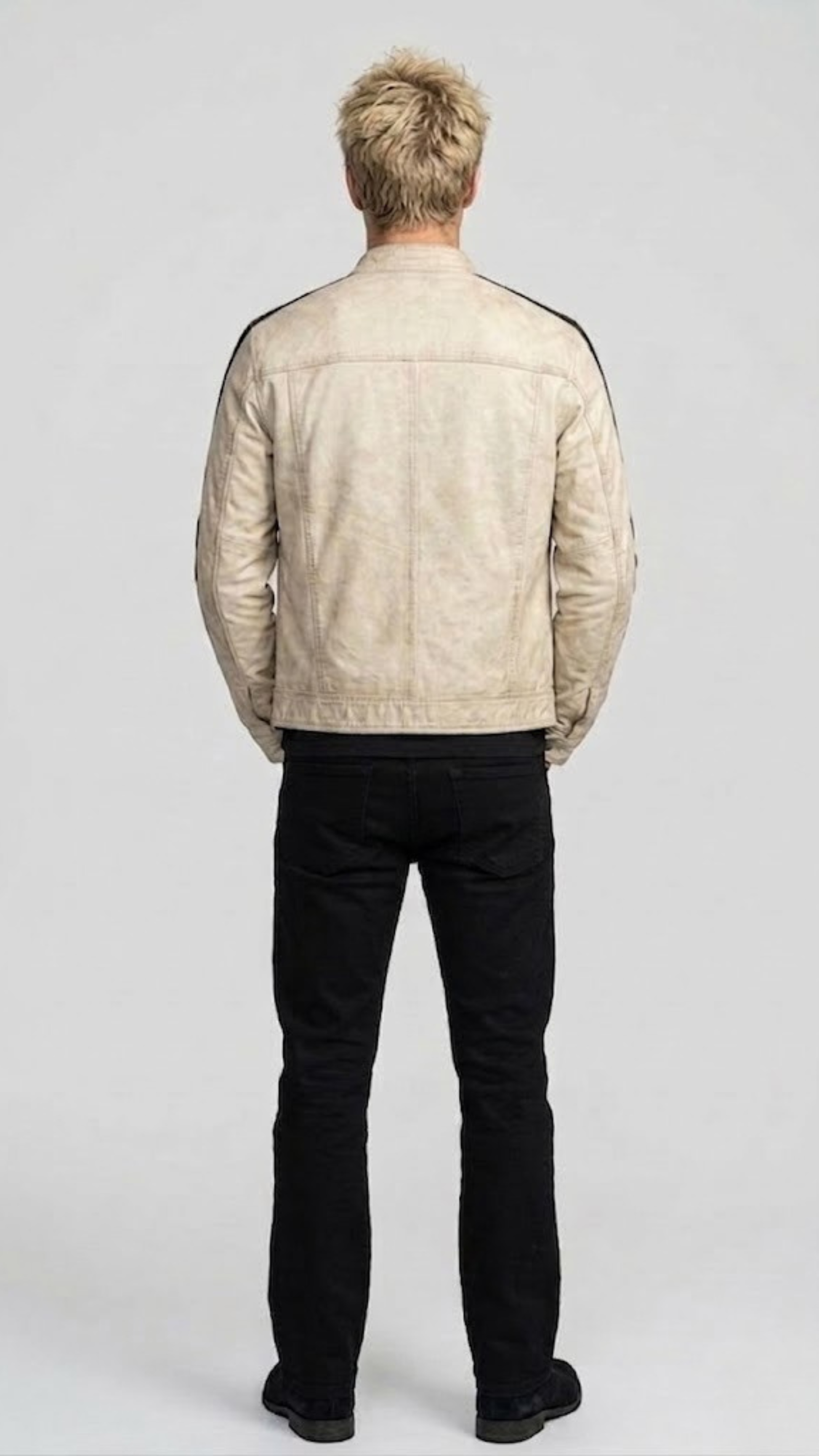 Symmetrical rear view studio shot highlighting the minimalist panel structure and pristine cream leather profile of the luxury racer coat.
