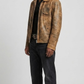 Jackero vintage light brown distressed leather jacket highlighting the shoulder fit.