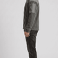 Sleek minimalist charcoal grey suede outerwear with matte finish detailing, perfect for casual and smart occasions.