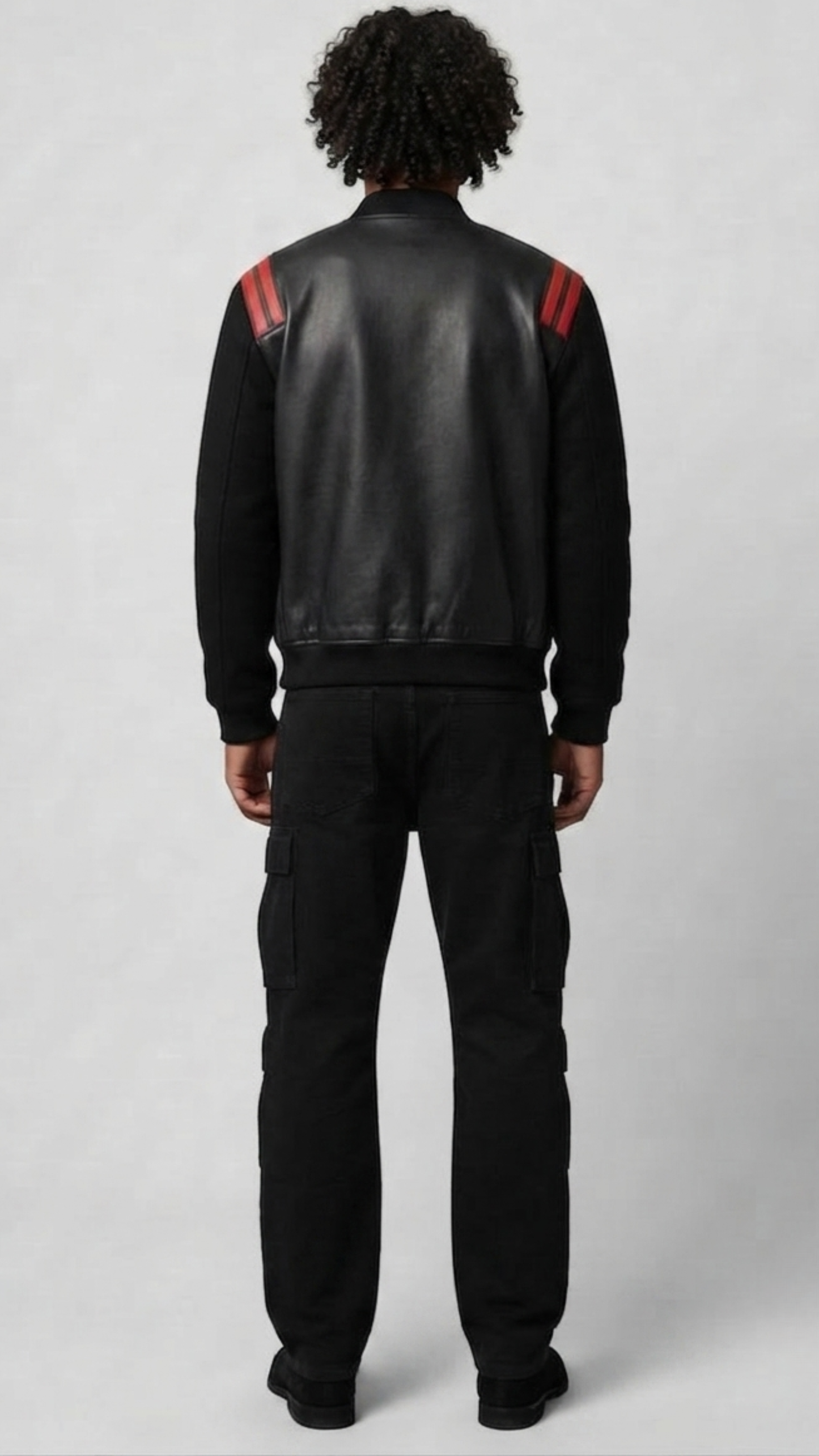 Regular fit men's two-tone leather bomber jacket displaying clean side pockets and a comfortable, streamlined athletic profile.