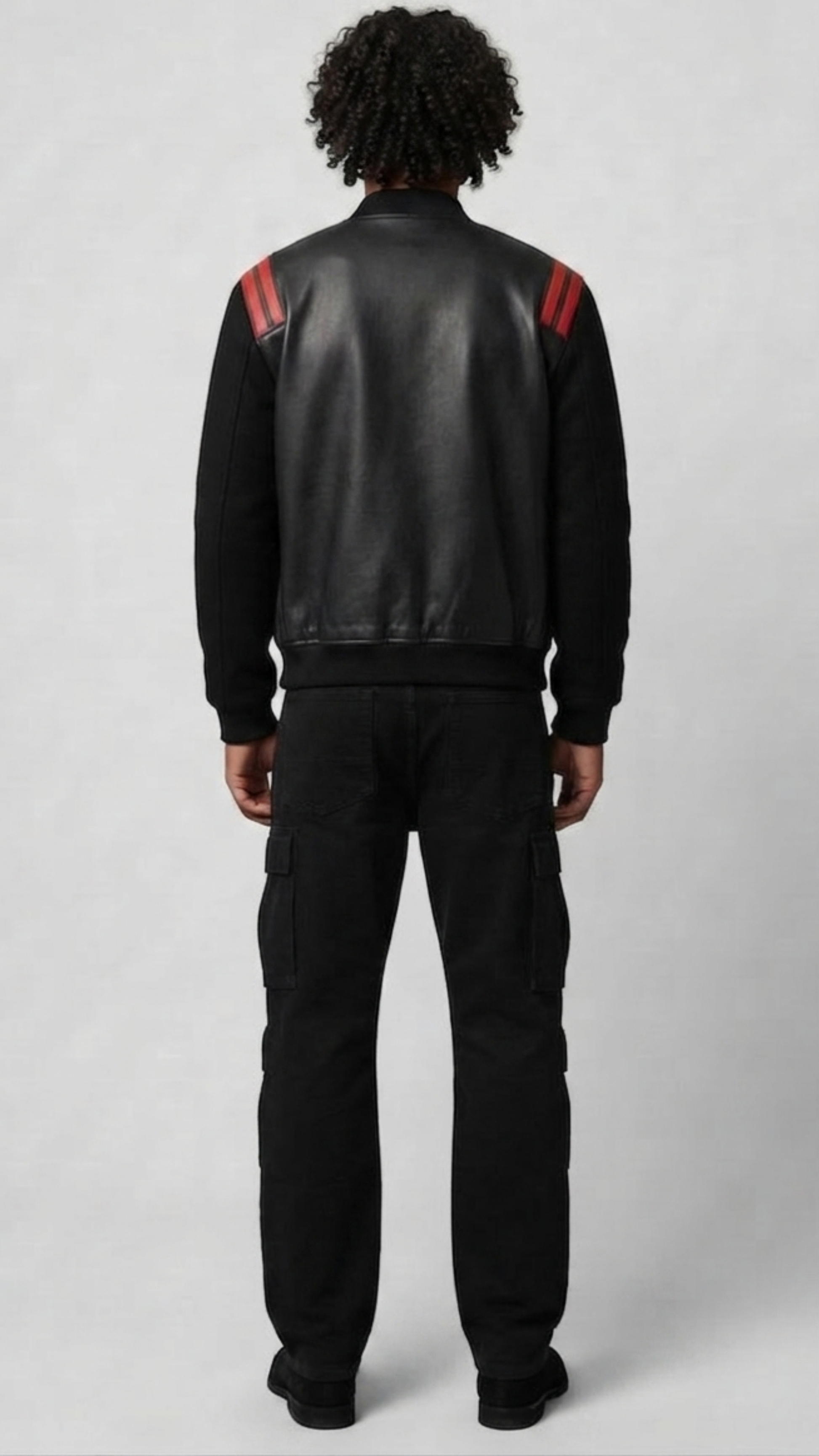 Regular fit men's two-tone leather bomber jacket displaying clean side pockets and a comfortable, streamlined athletic profile.