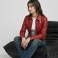 Bold urban streetwear fashion concept featuring a striking red leather racer jacket styled for a contemporary lifestyle aesthetic.