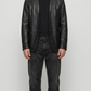 Jackero black leather blazer showcasing a crisp slim-fit tailoring design and structural lapels.