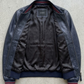 Jackero jacket flat lay presentation featuring the contemporary deep sapphire blue leather casual jacket neatly displayed on a neutral background.