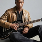 Retro fashion aesthetic featuring a premium light brown distressed leather outerwear on a light grey background.