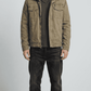 premium olive green cotton jacket featuring a cozy white shearling collar and secure button closures.