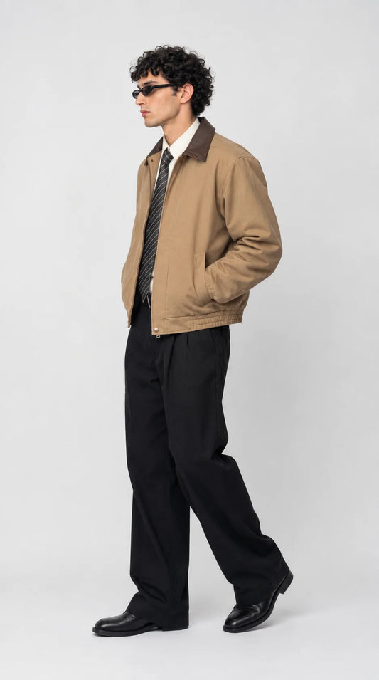 Smart casual outfit featuring a beige Harrington jacket, white shirt, grey striped tie and black pleated trousers