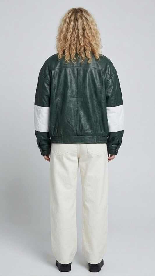 Straight-on back view showcasing the relaxed, oversized fit and clean tailoring of a dark green leather racer jacket.