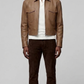 the Jackero premium beige leather bomber jacket styled with clean minimalist casual wear
