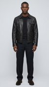A professional studio front shot of the Jackero premium black leather jacket, showcasing its clean, unblemished texture and minimalist zip-up front.
