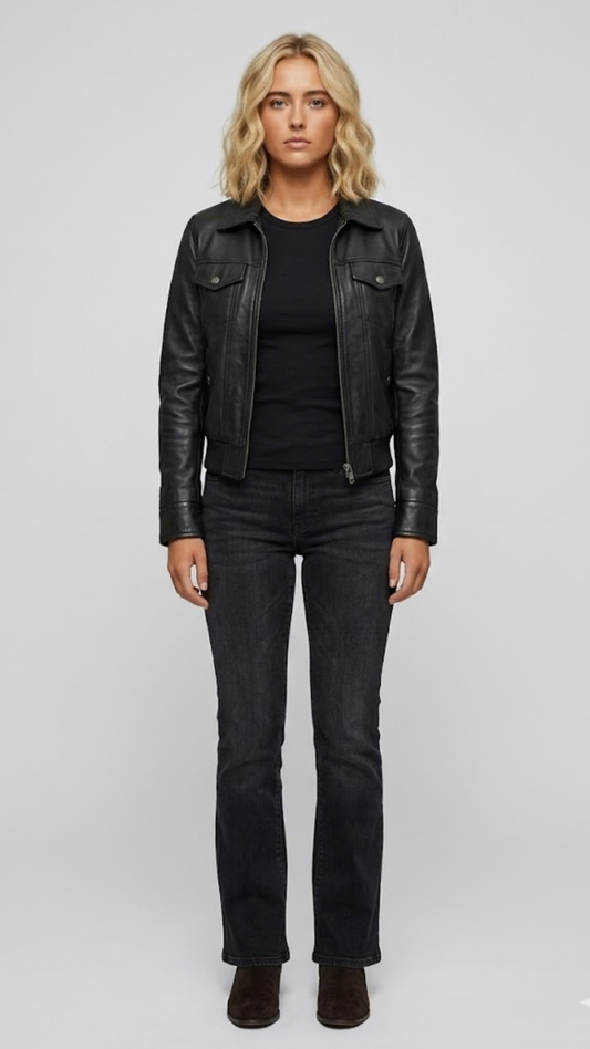 A premium black leather bomber jacket displayed against a clean grey studio background, showcasing its sleek fit and high-quality material.