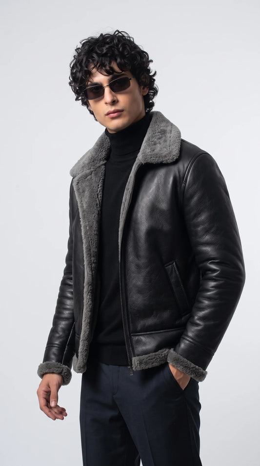 Channel ultimate rebel energy with the Jackero black leather jacket, featuring a plush grey shearling collar that perfectly balances hardcore biker aesthetics with premium winter comfort.