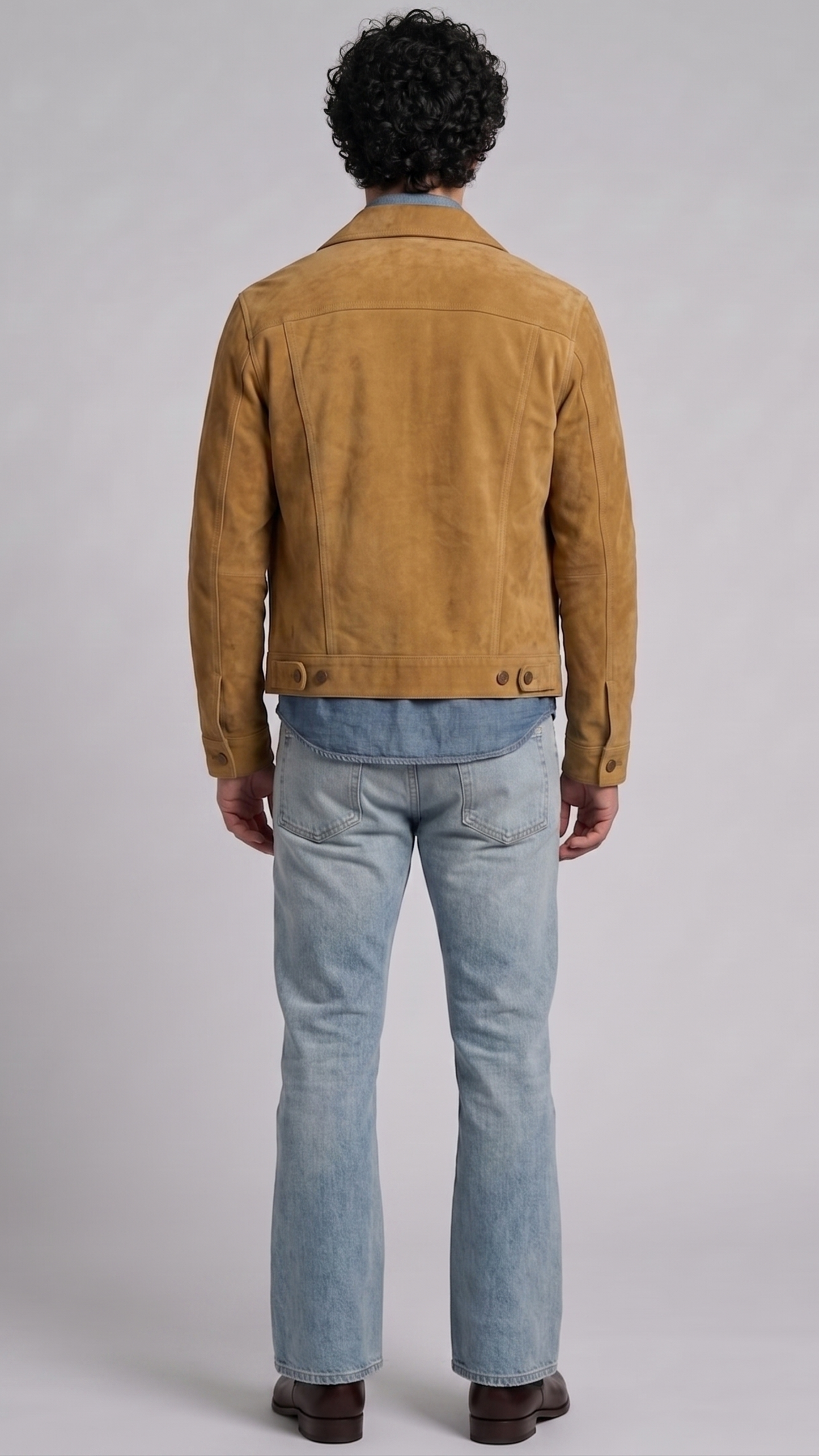 Regular fit men's tan suede outerwear displaying clean side welt pockets and adjustable button cuffs for a tailored profile.