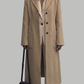 sharp camel-colored long wool coat designed with a tailored fit.