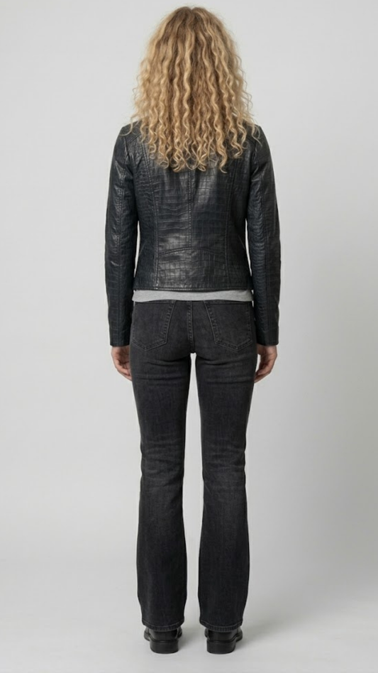 back-angle profile view of a tailored fit women's black crocodile leather outerwear displaying a clean waistline alignment and sleek sleeves.