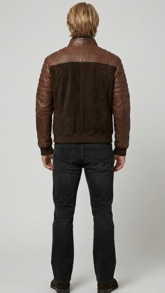 Straight-on back view of a structured brown quilted suede jacket highlighting its tailored fit and clean panel lines on a grey backdrop.