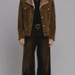 Front full view of a men's dark mustard suede Western jacket featuring a plush warm fur collar and clean zipper front.