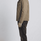 Durable olive green utility cotton jacket with warm insulated shearling, perfect for outdoor winter activities.