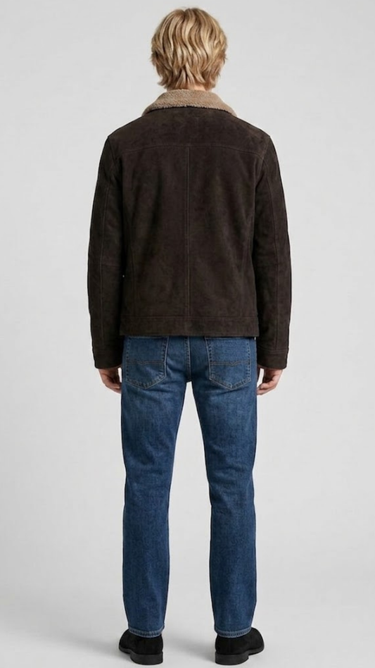 Regular fit dark brown suede shearling jacket layered over a casual knitted sweater for a modern urban aesthetic.