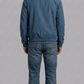 Detailed view of the premium matching cyan rib-knit collar, cuffs, and hemline on a structured lightweight casual jacket.