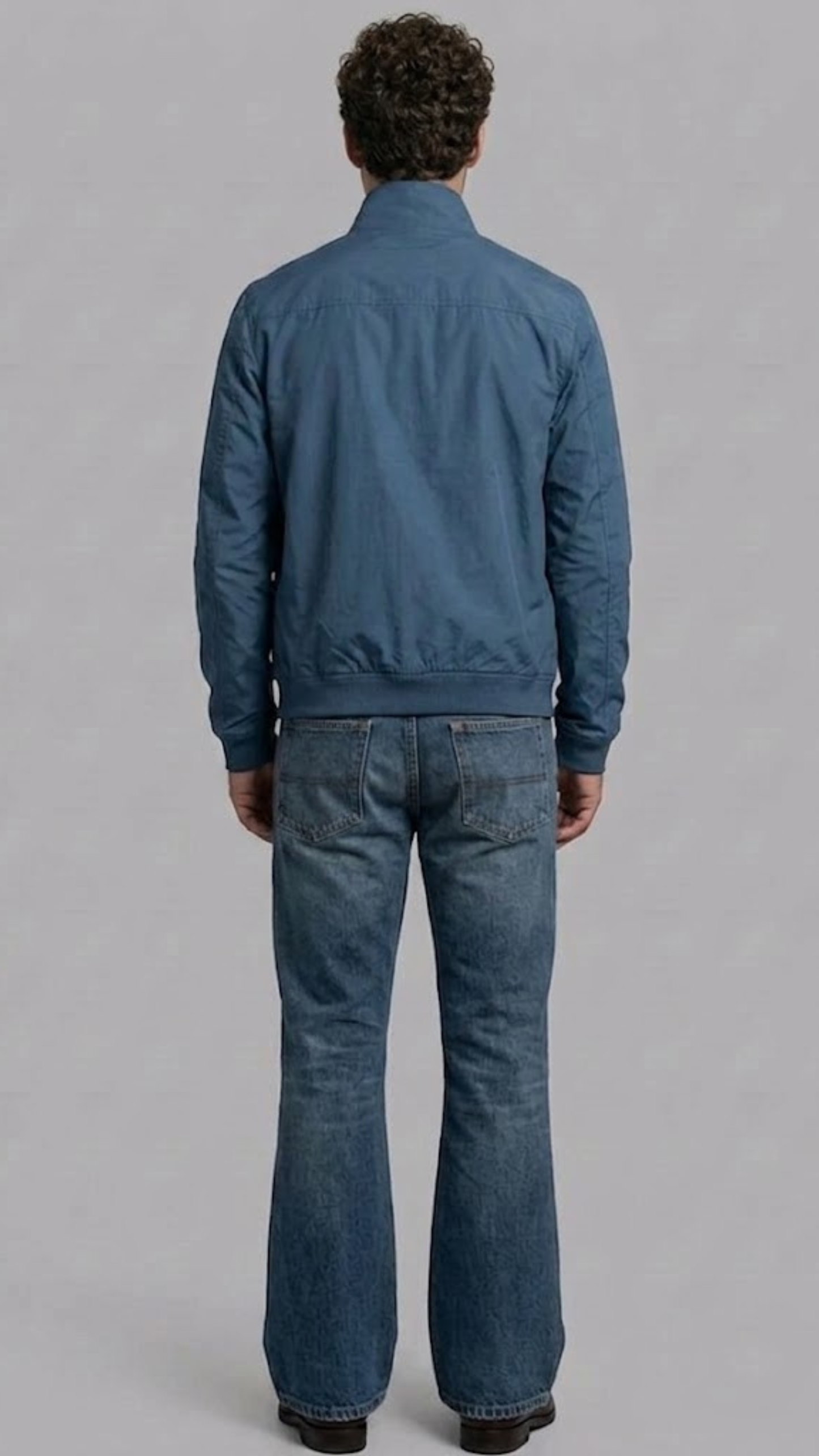 Detailed view of the premium matching cyan rib-knit collar, cuffs, and hemline on a structured lightweight casual jacket.
