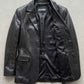 Flat lay view of Jackero black crocodile women blazer showing smooth inner lining and tailored collar structure