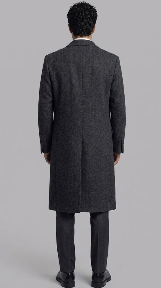 Regular fit men's dark grey wool long coat with functional side pockets, offering a clean modern profile.